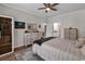 Bright bedroom with white trim, ensuite bathroom access, and neutral decor at 6069 Tramonto St., Myrtle Beach, SC 29572