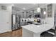 A well-appointed kitchen with gray cabinets, stainless steel appliances, and a white tile backsplash at 6069 Tramonto St., Myrtle Beach, SC 29572