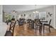 Open-concept living space featuring hardwood floors, modern lighting, and comfortable seating at 6069 Tramonto St., Myrtle Beach, SC 29572