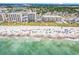 Breathtaking aerial view of a vibrant beach with clear blue waters, beachfront condos, and sunny skies at 6203 Catalina Dr. # 2316, North Myrtle Beach, SC 29582