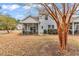 Spacious backyard showcasing a screened porch, patio, and lush greenery, offering a perfect outdoor living space at 6203 Catalina Dr. # 2316, North Myrtle Beach, SC 29582