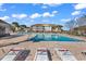 Beautiful community pool surrounded by lounge chairs and lush landscaping, perfect for relaxation and recreation at 6203 Catalina Dr. # 2316, North Myrtle Beach, SC 29582