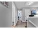 Upstairs hallway showcasing access to bedrooms and bathrooms, with neutral tones and soft carpet at 6203 Catalina Dr. # 2316, North Myrtle Beach, SC 29582