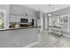 Bright kitchen with white cabinetry, modern appliances, and a breakfast nook with natural light at 6203 Catalina Dr. # 2316, North Myrtle Beach, SC 29582