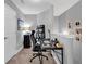 Functional home office with neutral carpet and paint, featuring a desk and ample storage at 6203 Catalina Dr. # 2316, North Myrtle Beach, SC 29582