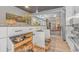 Well-equipped kitchen with custom cabinetry and pull-out drawers and stainless appliances at 67 Massick Ln., Pawleys Island, SC 29585