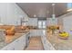 Modern kitchen featuring stainless steel appliances, granite countertops, and ample cabinet space at 67 Massick Ln., Pawleys Island, SC 29585