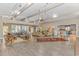 Expansive living space with beamed ceilings, hardwood floors, and an open layout flowing into the kitchen at 67 Massick Ln., Pawleys Island, SC 29585