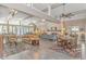 Bright, open living space with beamed ceilings, a cozy seating area, and seamless access to the kitchen and dining area at 67 Massick Ln., Pawleys Island, SC 29585