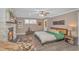 This main bedroom features a ceiling fan, fireplace, and an ensuite bathroom at 67 Massick Ln., Pawleys Island, SC 29585
