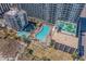 An aerial view of resort buildings, pool, parking and recreational areas at 7200 N Ocean Blvd. # 662, Myrtle Beach, SC 29572