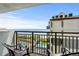 Balcony featuring ocean and pool views, with comfortable seating at 7200 N Ocean Blvd. # 662, Myrtle Beach, SC 29572
