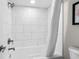 Bright bathroom featuring tiled walls and shower at 7200 N Ocean Blvd. # 662, Myrtle Beach, SC 29572