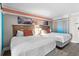 Inviting bedroom with two comfortable beds and stylish decor at 7200 N Ocean Blvd. # 662, Myrtle Beach, SC 29572