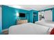 A bright bedroom with two beds, dresser, and closet space at 7200 N Ocean Blvd. # 662, Myrtle Beach, SC 29572