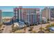 Coastal resort exterior with high-rise condos and a multi-level parking garage at 7200 N Ocean Blvd. # 662, Myrtle Beach, SC 29572