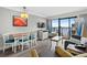 Inviting living area with a comfortable sofa, dining set, and balcony access offering scenic views at 7200 N Ocean Blvd. # 662, Myrtle Beach, SC 29572