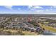 Gorgeous aerial view of a sprawling neighborhood near golf courses, ponds, and the ocean at 730 Pickering Dr. # 201, Murrells Inlet, SC 29576