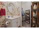 Bathroom with vanity, toilet, and linen closet at 730 Pickering Dr. # 201, Murrells Inlet, SC 29576
