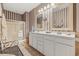 Bathroom featuring a double vanity, shower, and modern fixtures, perfect for relaxation and functionality at 730 Pickering Dr. # 201, Murrells Inlet, SC 29576