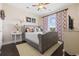 Cozy bedroom with neutral walls, plush carpet, and window views at 730 Pickering Dr. # 201, Murrells Inlet, SC 29576