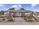 Beautiful condominium building featuring balconies, well maintained lawns, and convenient parking at 730 Pickering Dr. # 201, Murrells Inlet, SC 29576