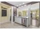 Open kitchen with white cabinets and view into the formal dining area at 730 Pickering Dr. # 201, Murrells Inlet, SC 29576