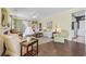 Bright living room featuring hardwood floors, a ceiling fan, and comfortable furniture at 730 Pickering Dr. # 201, Murrells Inlet, SC 29576