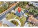 Aerial view of a brick home with fenced yard and driveway at 7714 Woodland Dr., Myrtle Beach, SC 29572