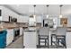 Bright and modern kitchen with granite countertops, stainless steel appliances, and a stylish backsplash at 7714 Woodland Dr., Myrtle Beach, SC 29572