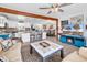 Open-concept living area with a seamless flow to the modern, well-equipped kitchen at 7714 Woodland Dr., Myrtle Beach, SC 29572