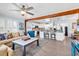 Open-concept living area with a seamless flow to the modern, well-equipped kitchen at 7714 Woodland Dr., Myrtle Beach, SC 29572