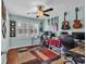 Large office featuring guitars on the wall, multiple monitors, and a ceiling fan at 7714 Woodland Dr., Myrtle Beach, SC 29572