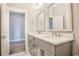 Bathroom featuring double sink vanity, modern fixtures, and neutral color palette at 8053 Laurel Ash Ave., Myrtle Beach, SC 29572