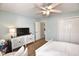 Bedroom featuring a large television, ceiling fan, and ample closet space at 807 Lalton Dr., Conway, SC 29526