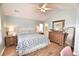 Inviting bedroom with vaulted ceiling, wood look floors and full furnishing with bathroom access at 807 Lalton Dr., Conway, SC 29526