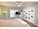 Bedroom featuring a ceiling fan, cartoon stickers, and a large window at 807 Lalton Dr., Conway, SC 29526