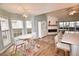 Cozy kitchen with seating, a fireplace and a small dining nook with lots of windows and natural light at 807 Lalton Dr., Conway, SC 29526