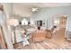 Bright living room with vaulted ceilings and fireplace that flows into the dining room and kitchen at 807 Lalton Dr., Conway, SC 29526