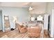 Bright living room with vaulted ceilings and a view into the dining room featuring comfortable seating at 807 Lalton Dr., Conway, SC 29526
