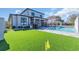 Backyard showcasing pool, lawn, and outdoor dining at 823 Waterton Ave., Myrtle Beach, SC 29579