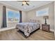 Bright bedroom with hardwood floors, ceiling fan, and natural light at 823 Waterton Ave., Myrtle Beach, SC 29579