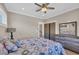 Bedroom featuring a ceiling fan, neutral color scheme, and a dresser at 823 Waterton Ave., Myrtle Beach, SC 29579