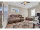 Comfortable bonus room featuring a sofa, beanbag chair, ceiling fan, and neutral color scheme at 823 Waterton Ave., Myrtle Beach, SC 29579