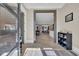 Bright foyer with tile flooring, shoe storage and clear view to an open concept kitchen, dining, and living area at 823 Waterton Ave., Myrtle Beach, SC 29579