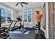 Spacious home gym with state-of-the-art equipment and ample natural light at 823 Waterton Ave., Myrtle Beach, SC 29579