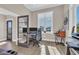 Well-lit home office with a large window, desk setup, and stylish decor at 823 Waterton Ave., Myrtle Beach, SC 29579