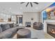 Cozy living room features a modern fireplace, comfortable seating, and an open layout to the kitchen area at 823 Waterton Ave., Myrtle Beach, SC 29579
