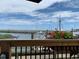 Beautiful channel view from the porch with flowers and boating docks nearby at 85 Northbrook Dr, Murrells Inlet, SC 29576