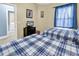 Bedroom featuring a TV, and view to the laundry room from the beds at 881 Palmetto Trail # 103, Myrtle Beach, SC 29577